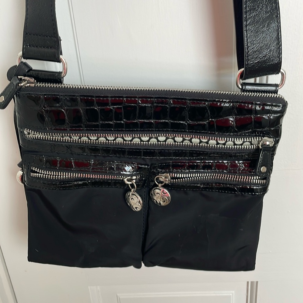 Brighton black cross body bag
Gently used